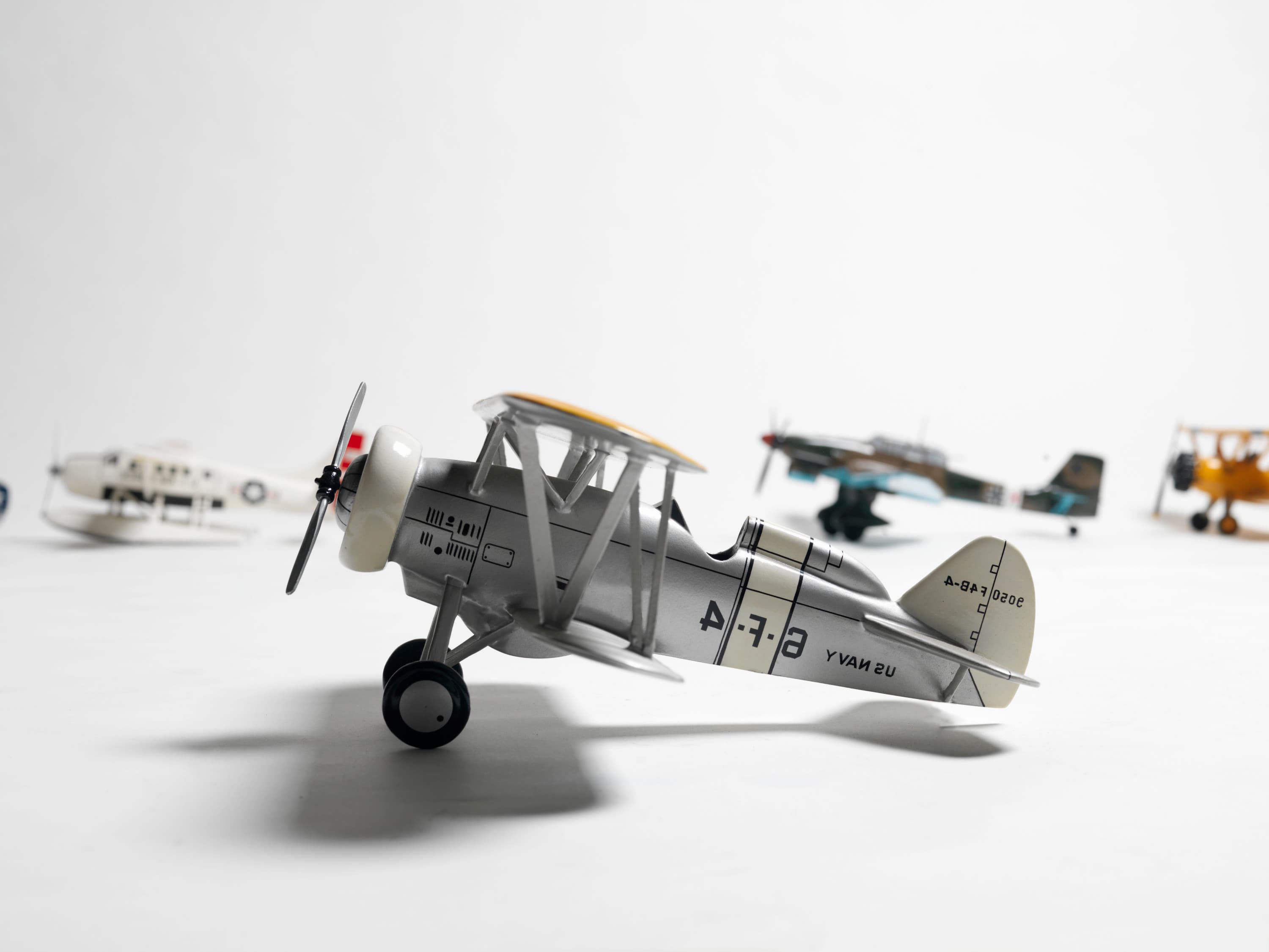 Retro toy airplanes representing the journey from launch to active flight